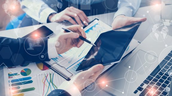 Business people meeting with technology in office, visual interfaces effects